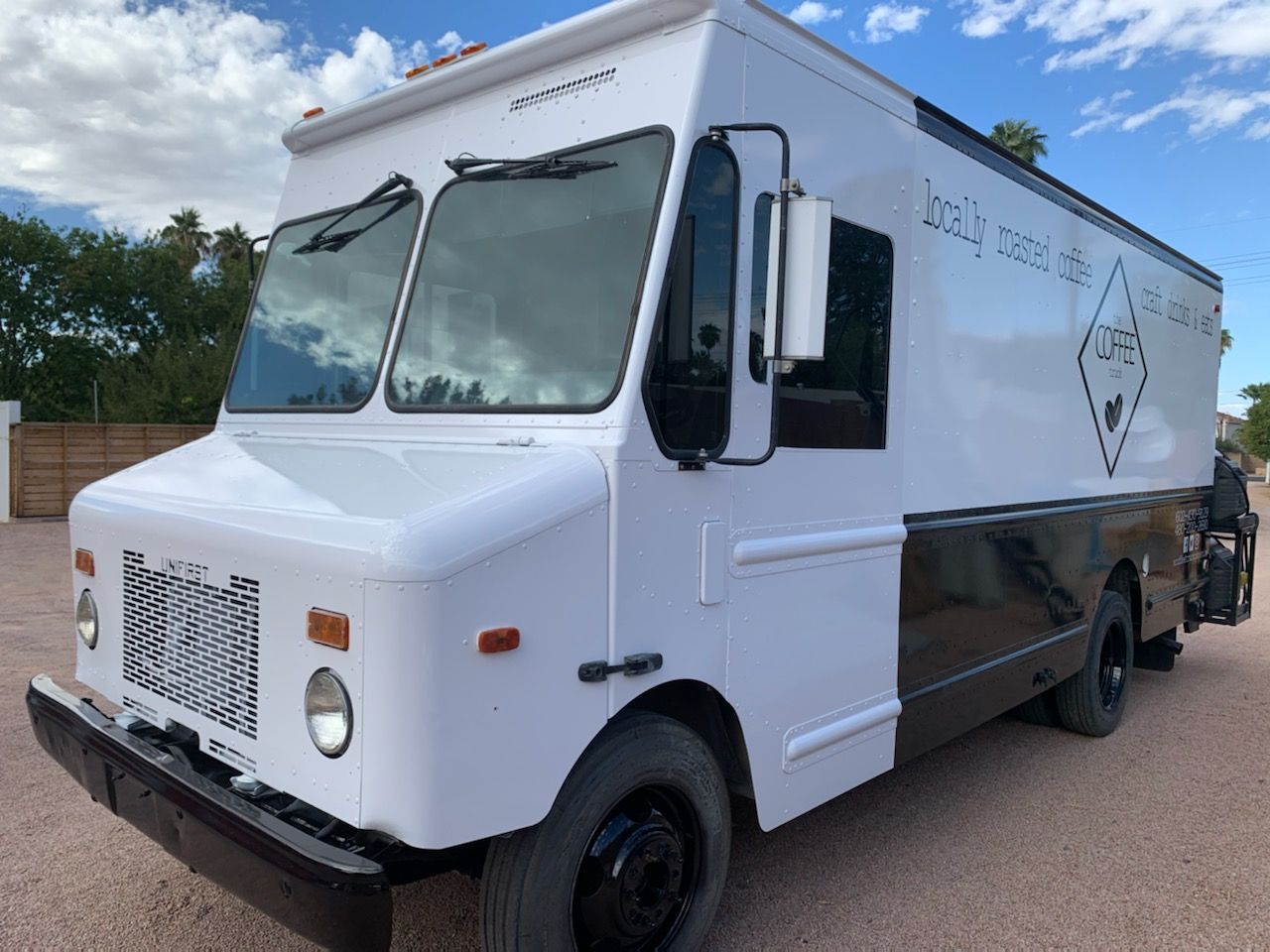 White 2001 Workhorse step van coffee truck, front three quarter view